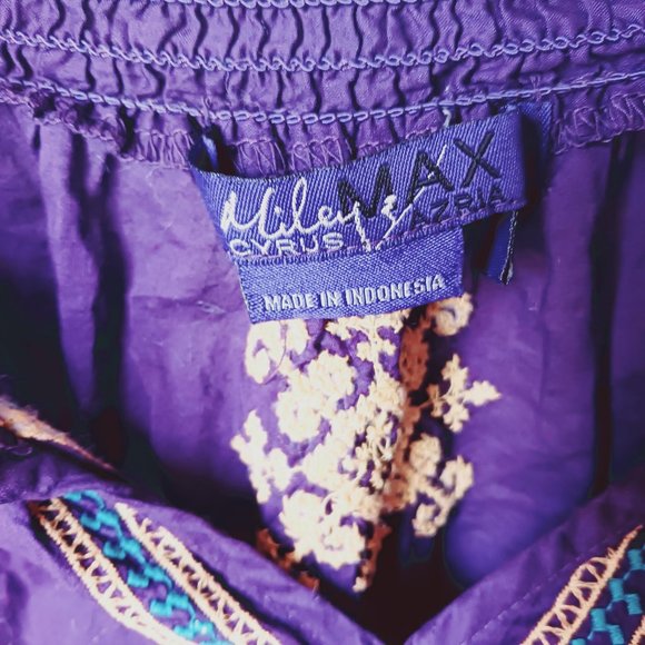 Purple, with gold and aqua color design stitching. Long sleeve crop top. - Picture 3 of 7